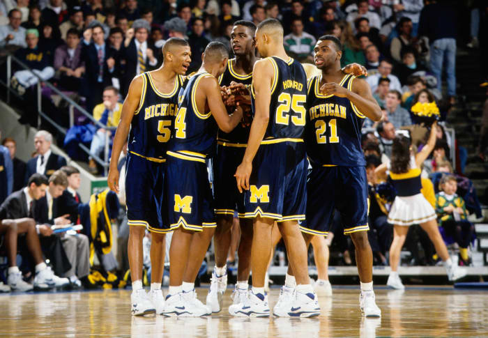 The 1992 Michigan Wolverines basketball team during a timeout.
